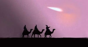 los tres reyes magos siguiendo al lucero en el desierto